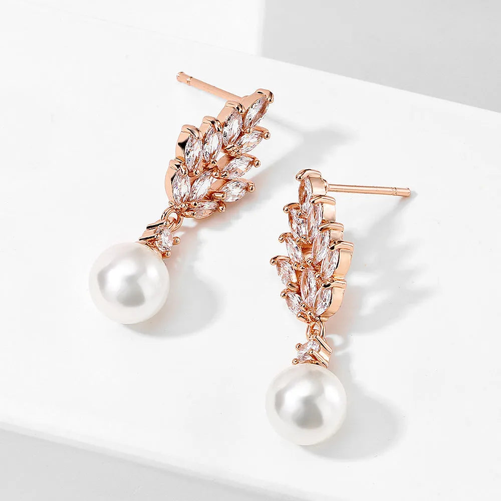Geometric earrings with micro zircon stones and flower design in gold, platinum or rose gold plating