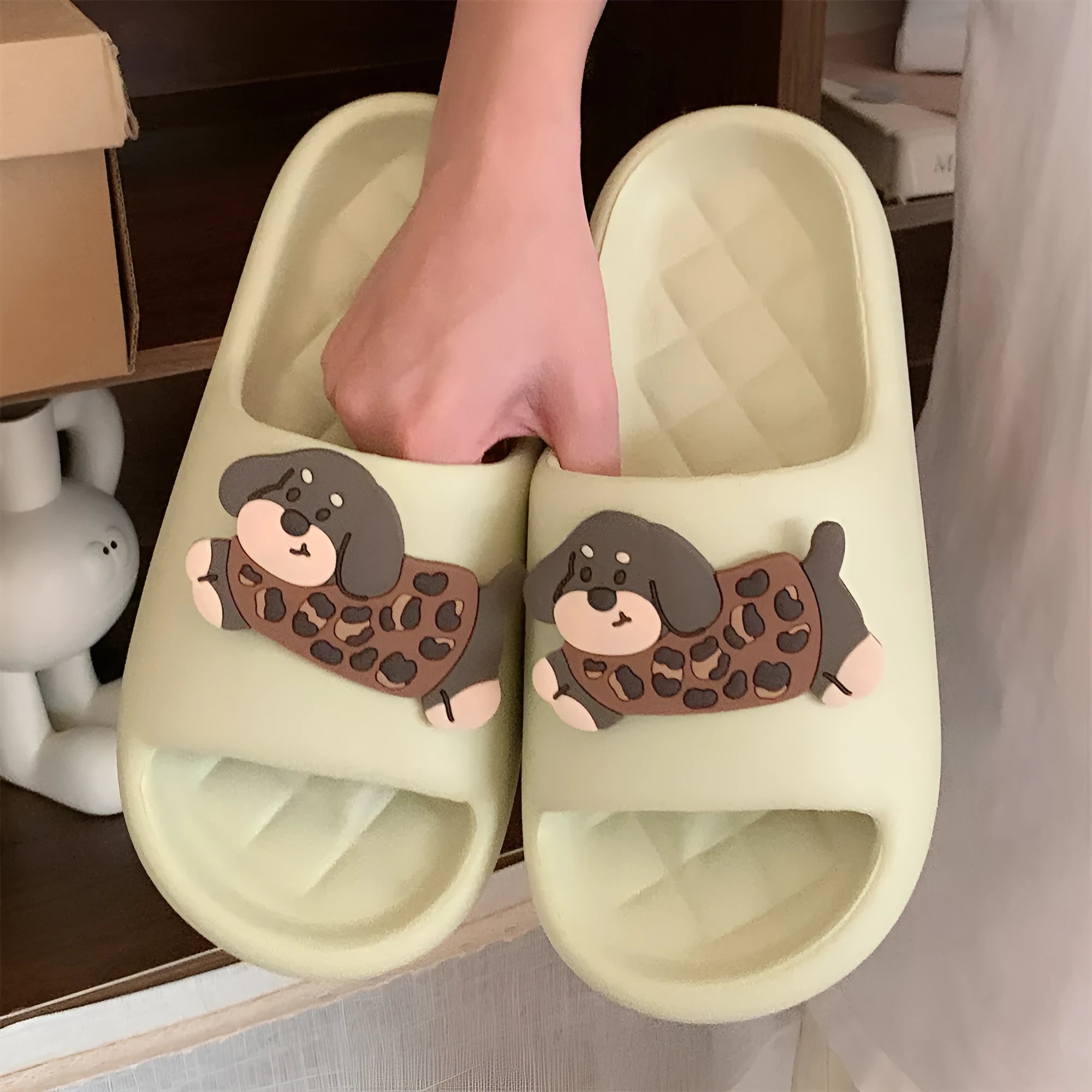 Pair of EVA flip flop sandals for couples in leopard puppy print, showing thickened sole.