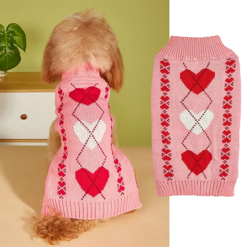 Red acrylic dog sweater with a large white love heart design on the back.