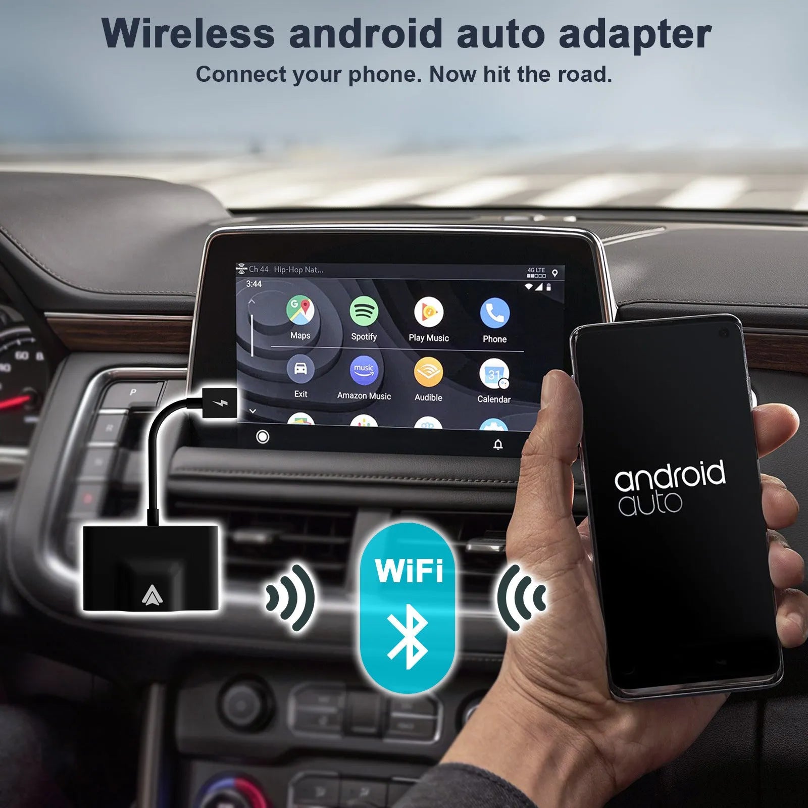 Black wireless Android Auto car adaptor connected to a car USB port with a smartphone displaying a navigation app wirelessly.