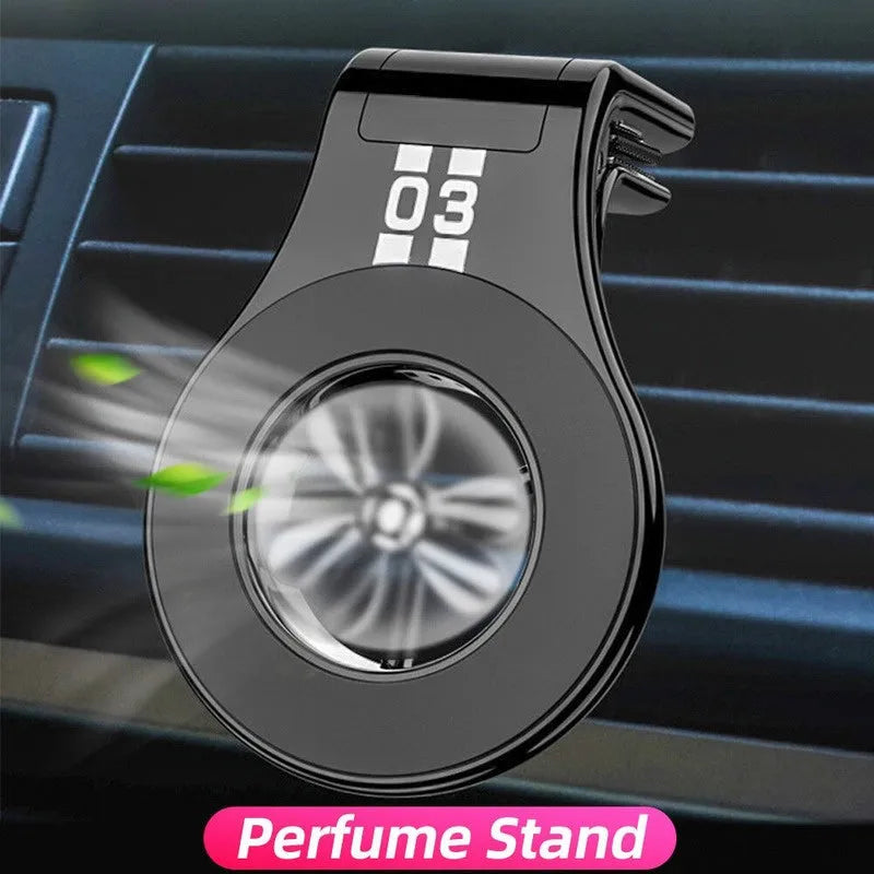 Black magnetic car air vent phone holder with adjustable rotation paddle showing phone mounting position