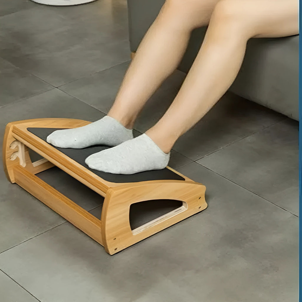 Wooden bamboo office desk footstool in a natural wood colour with a modern minimalist design.