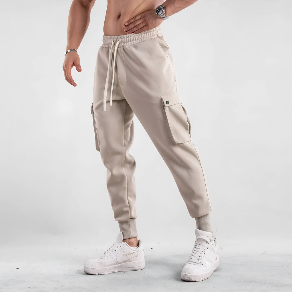 Men's loose cotton sports trousers with ankle ties and multiple pockets in various colour options