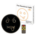 Black car rear window LED expression light showing orange smiley face display with remote control
