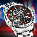 Silver automatic mechanical watch with hollow-out design showing luminous dial and stainless steel strap