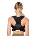 Black adjustable anti-humpback posture correction belt worn for back support.