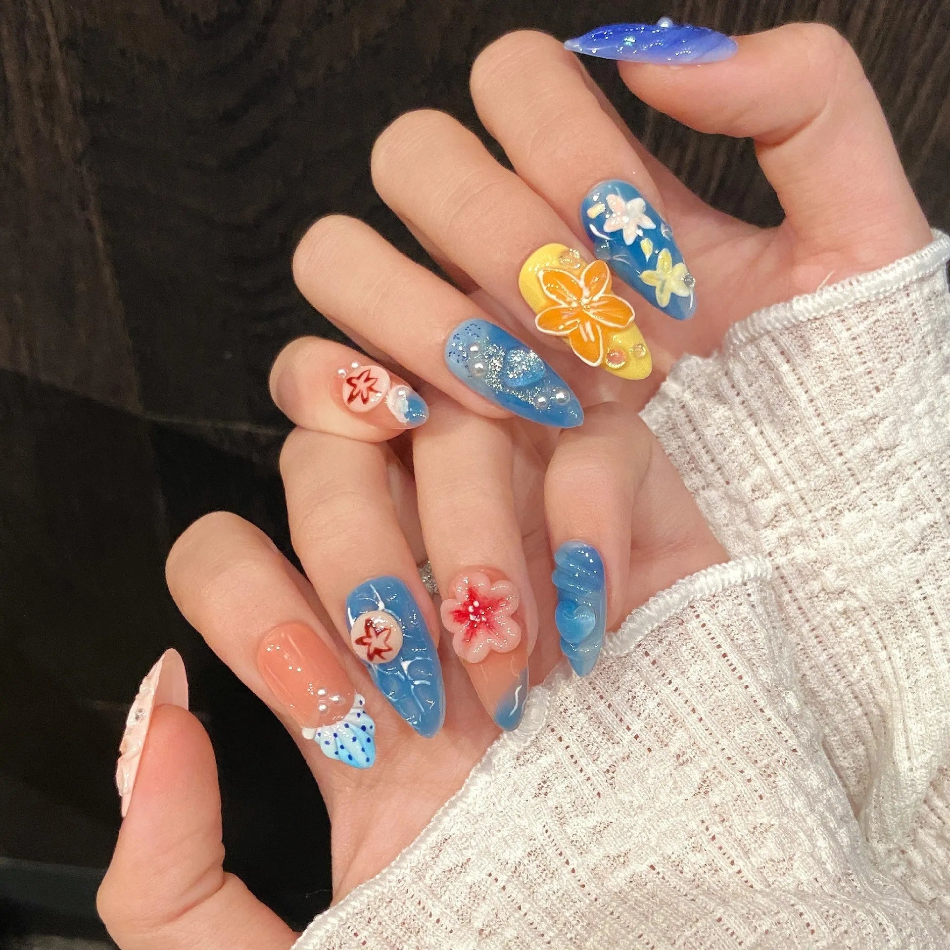 Three-dimensional carved jellyfish plastic wearable armour set in almond nail colour with rose and tulip patterns