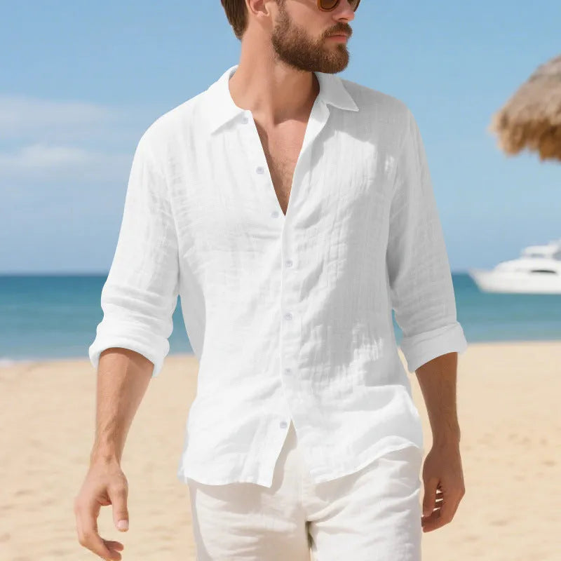Man wearing a loose-fitting linen casual shirt in a light colour, showing the non-iron texture and American style.