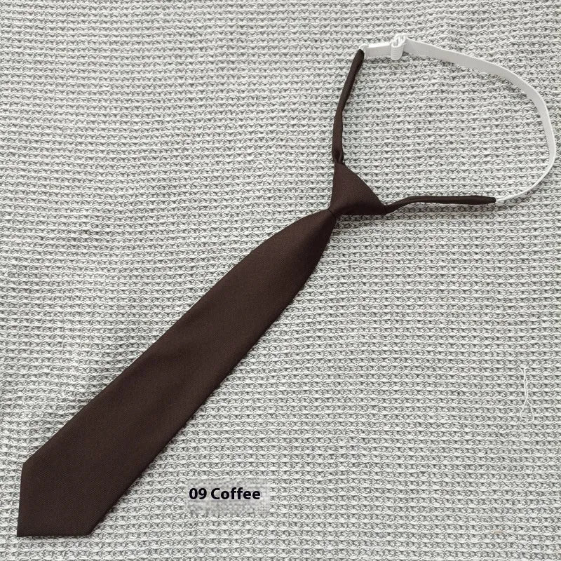 Men's navy blue cotton bow tie with arrow style on a plain background.