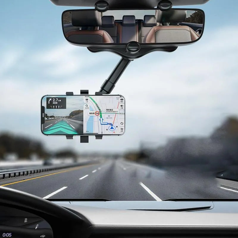 Black rearview mirror phone holder with rotating head and telescopic arm mounted on a car mirror.