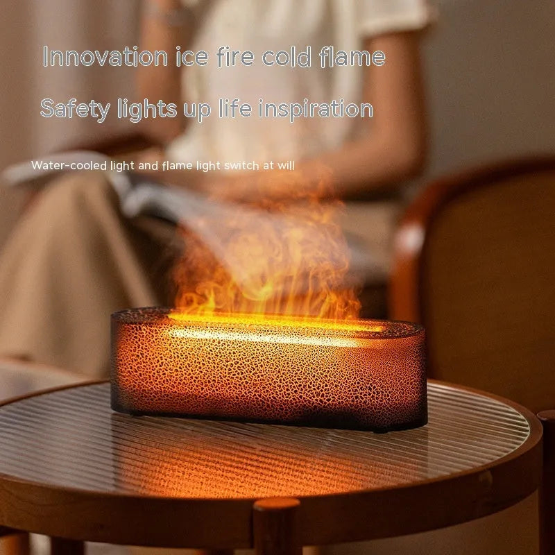 Square black creative lava flame USB desktop humidifier and essential oil diffuser on a desk.