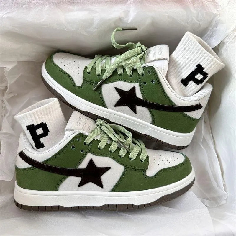 Women's retro style lace-up board shoes in green with rubber sole and round toe, flat heel