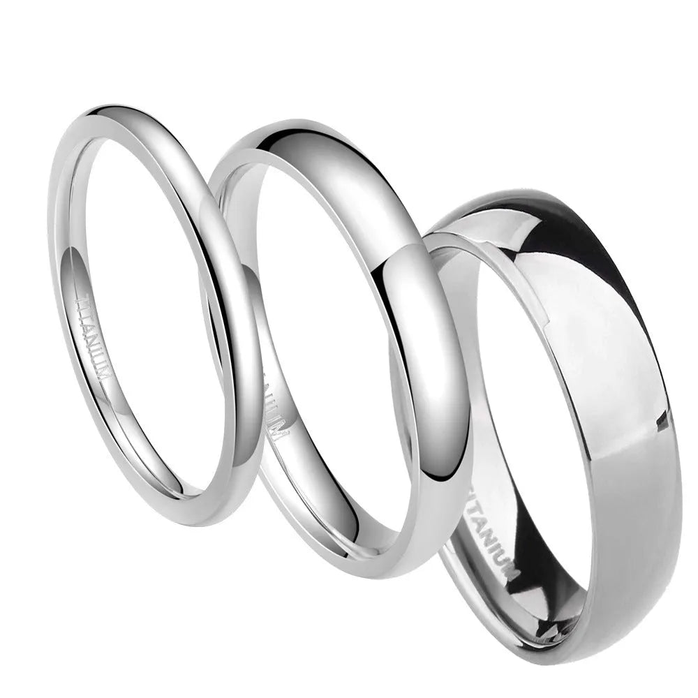 Silver titanium steel minimalist ring shown in various widths on a plain background.