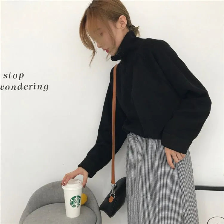 Women's loose fit long sleeve top with half-high collar in solid colours: white, apricot, black