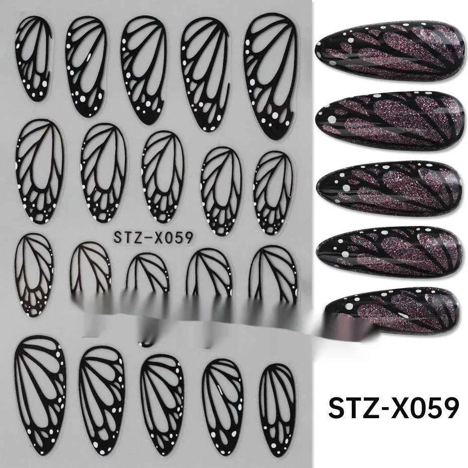 Pack of black and silver strip nail art stickers with cartoon and love pattern designs.