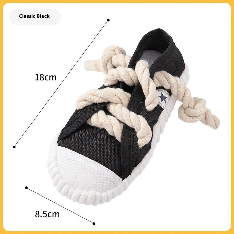 Flexible plastic dog chew toy shaped like a slipper in yellow, with a bendable design and sound chip.