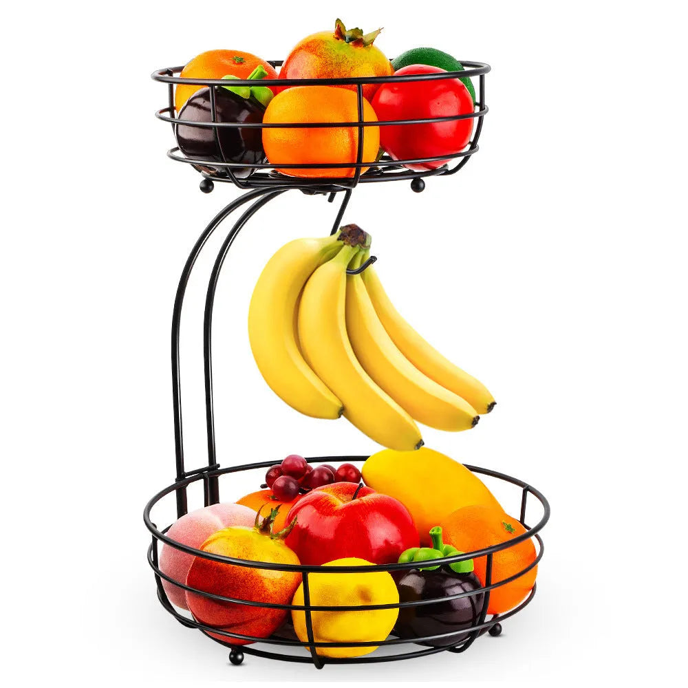 Black double-layer wrought iron fruit basket with open-weave shelves for storing produce.