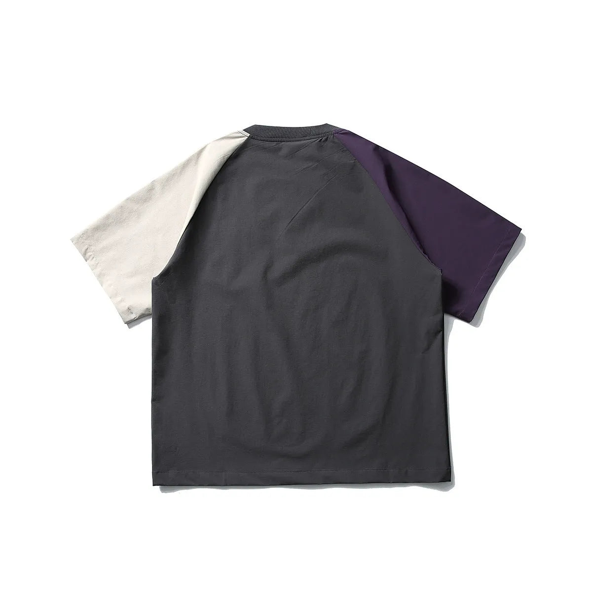 Dark grey men's loose-fit T-shirt with contrast colour raglan sleeves on a hanger.