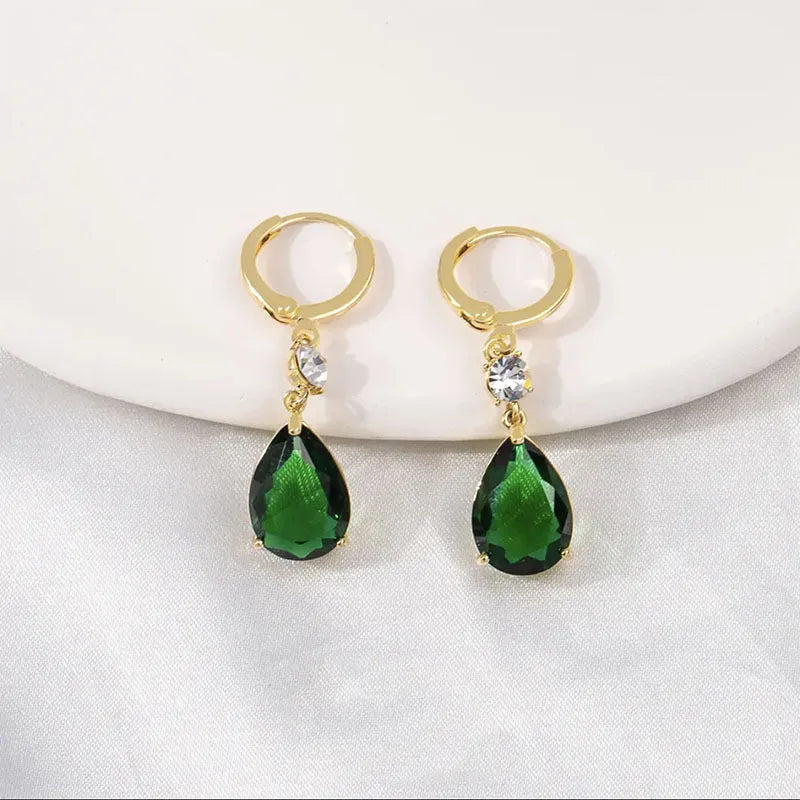Geometric teardrop alloy earrings in emerald green colour