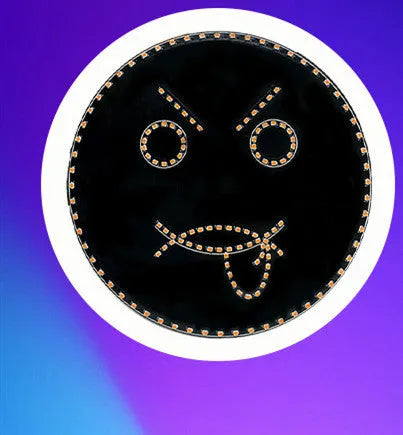 Black car rear window LED expression light showing orange smiley face display with remote control