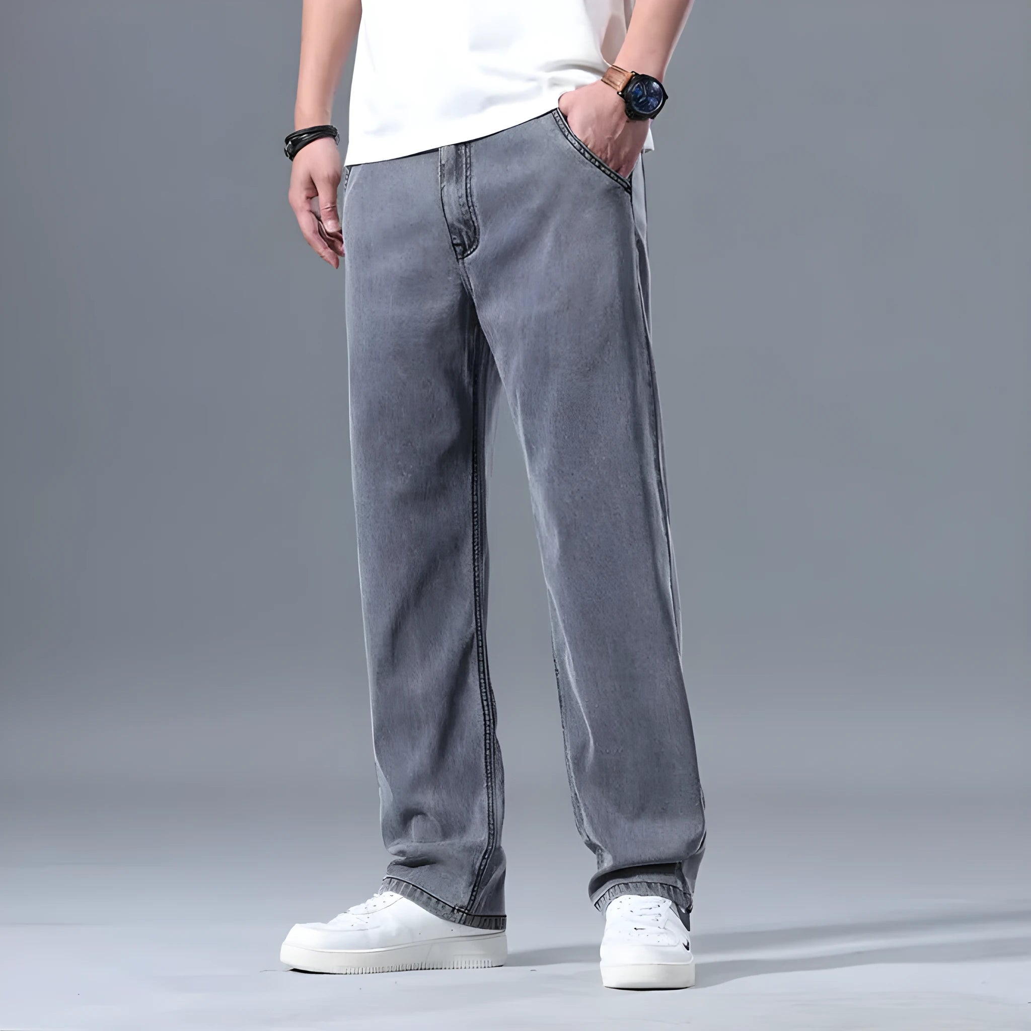 Men's loose straight-leg lyocell jeans in light blue, blue grey, smoky grey, and retro blue colours with zipper fly