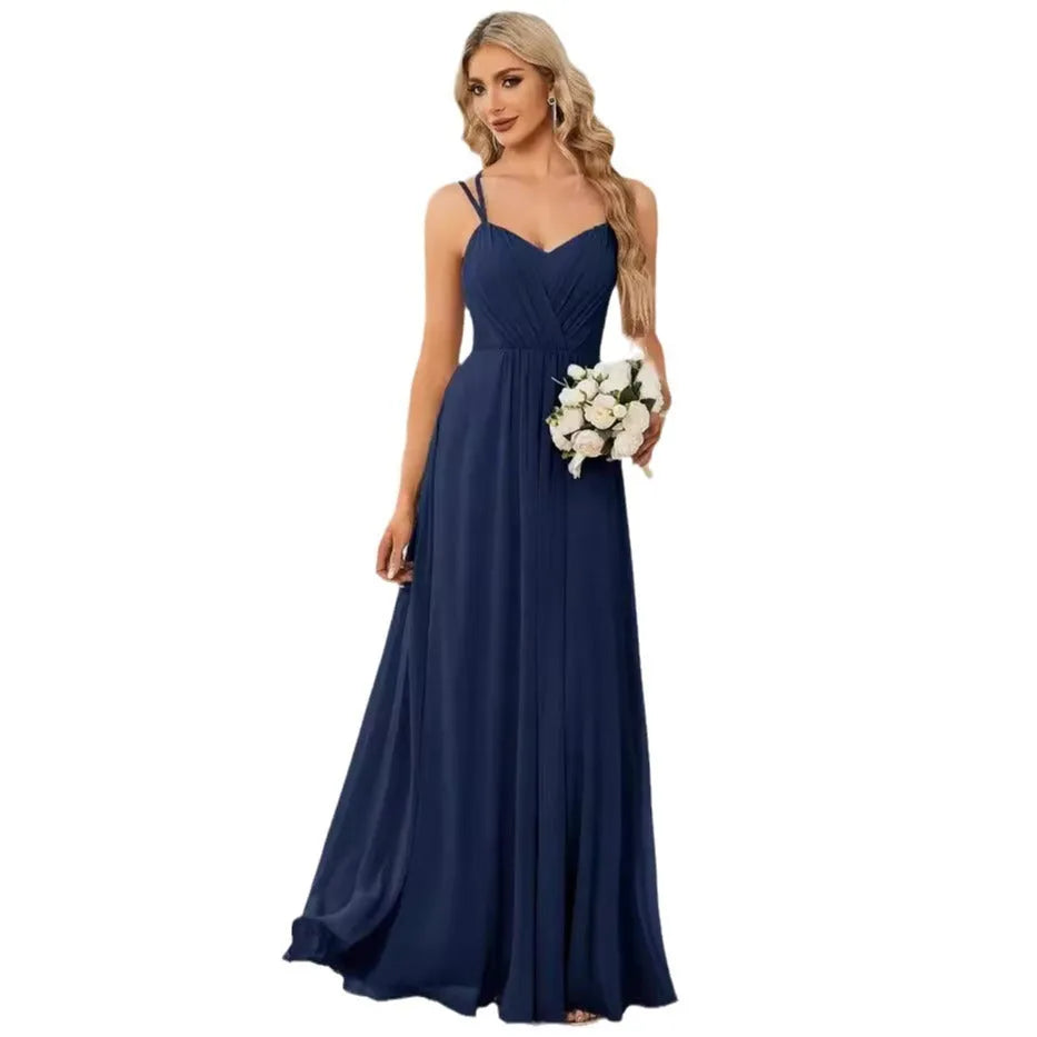 Women's light green sleeveless banquet dress with pleated A-line long skirt on a mannequin.