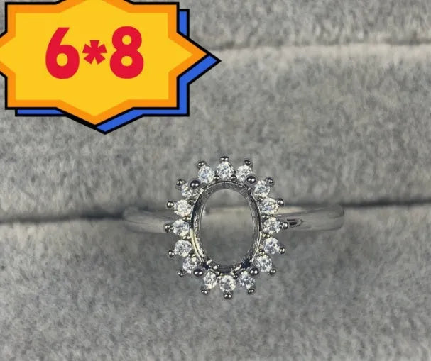 Oval denier open mouth ring with 6x8mm stone and five-pointed star on copper band.
