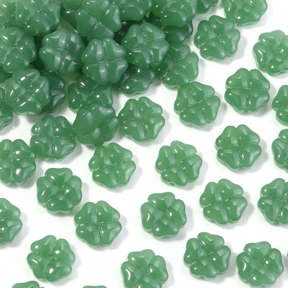 50 glass four-leaf clover beads in assorted colours with coloured glaze finish and 10mm straight hole design.