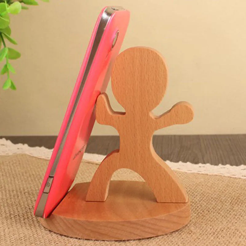 Decorative resin mobile phone stand in a choice of styles including animal figures and wood-effect designs.