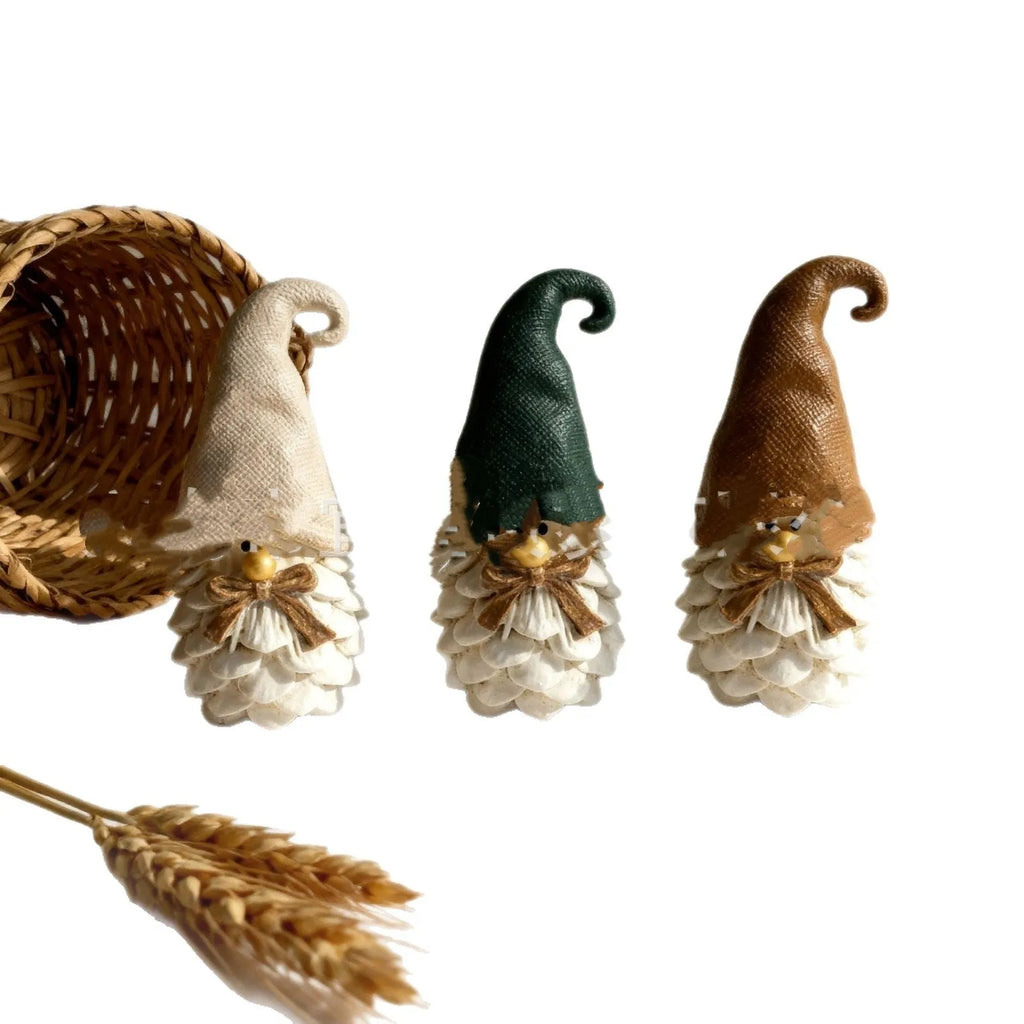Three resin dwarf pine cone decorations in a set, each 9x5x4cm, for autumn harvest festival display