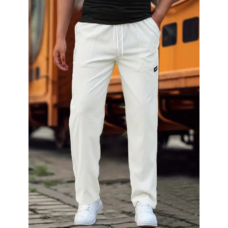 Men's casual polyester trousers for spring and autumn in various colours including light gray and black