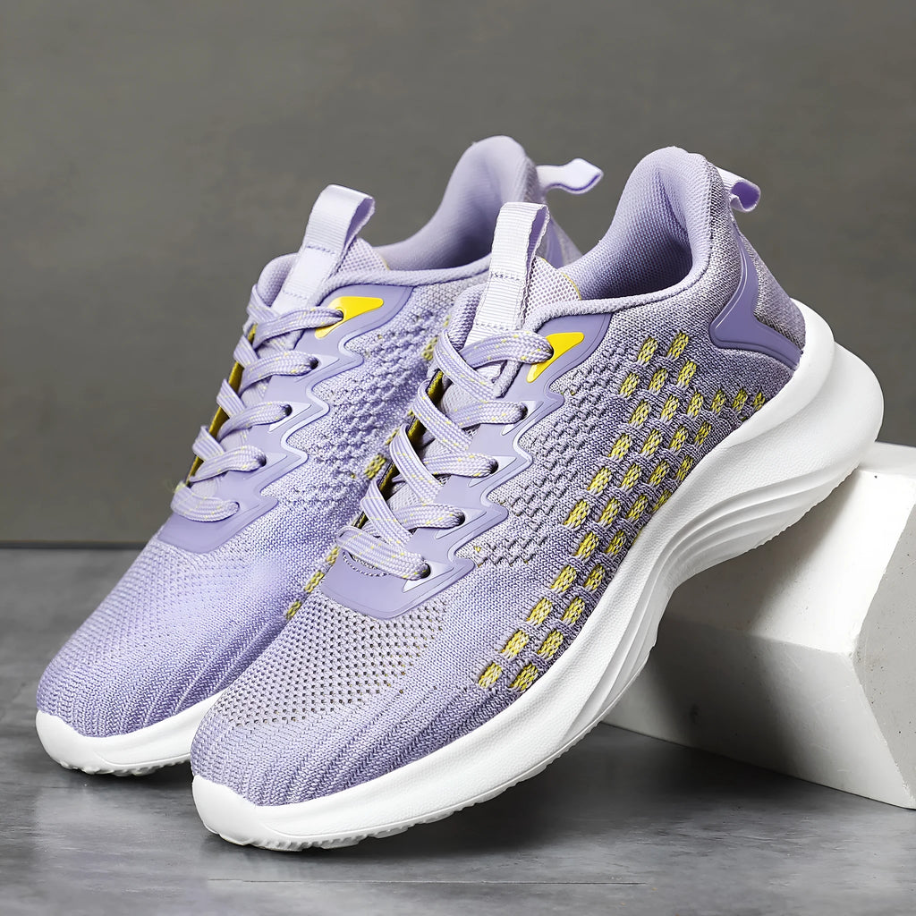 Women's Lavender Purple Flyknit running shoes with striped pattern and mesh lining on white background