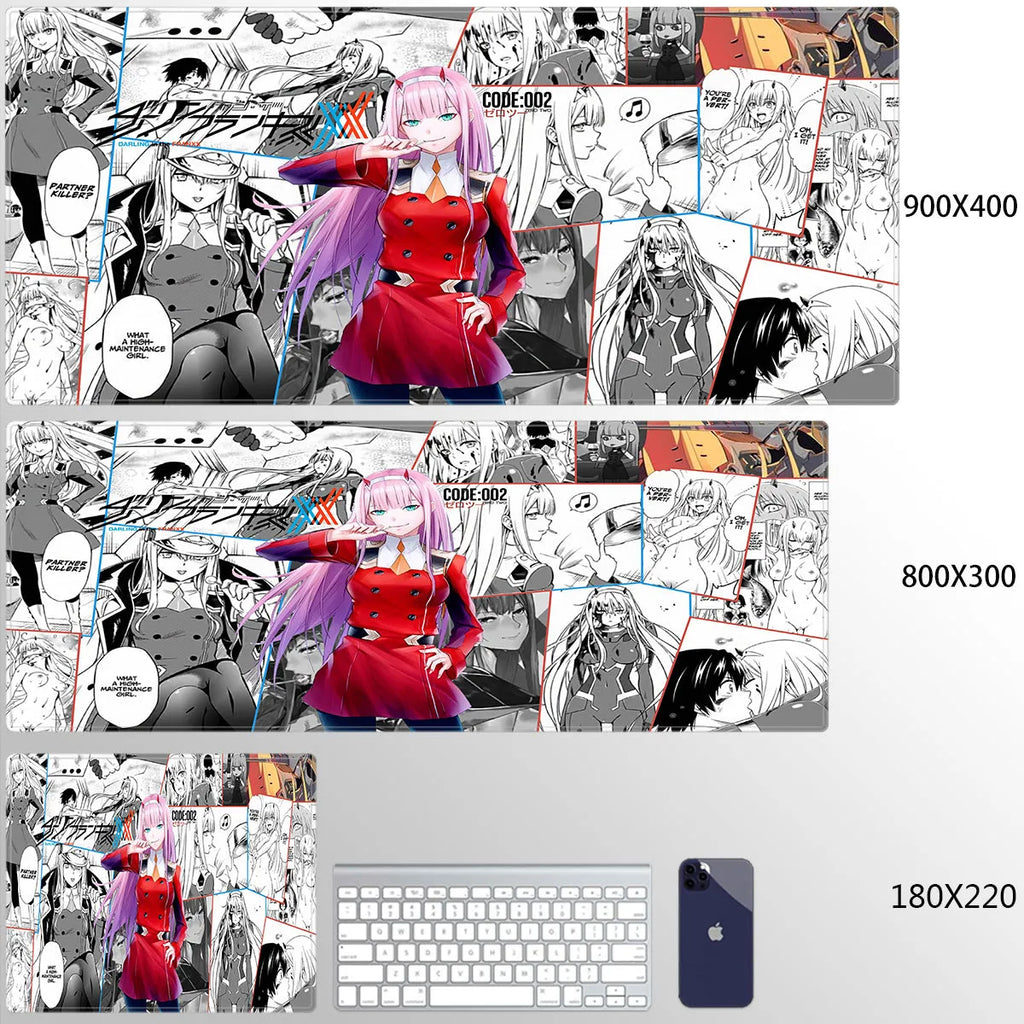 Pink cloth keyboard mat with Darling in the Franxx anime print on a desk