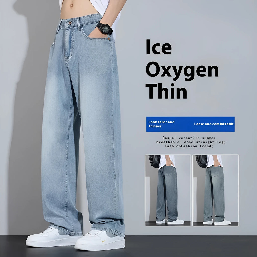 Straight-leg denim trousers in UK2560 blue with wide-leg silhouette and zip fly opening