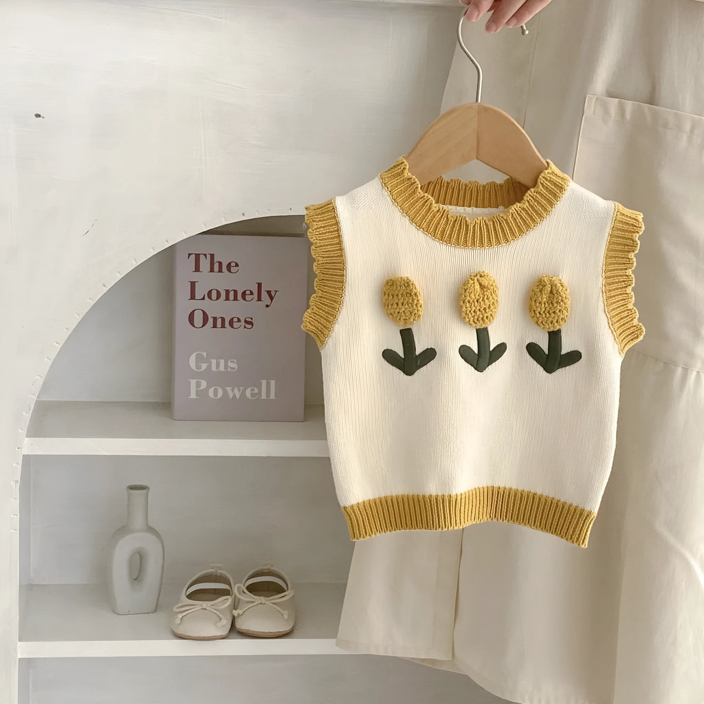 Baby girl sleeveless knitted cotton top with three-dimensional flower in almond white