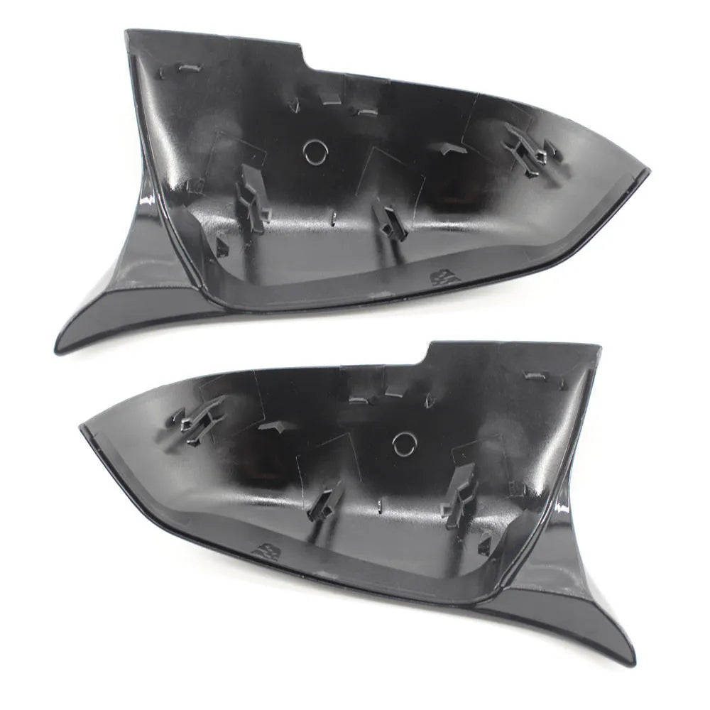 Paint bright black replacement rear-view mirror shell for BMW 3 Series and 4 Series F-model vehicles.