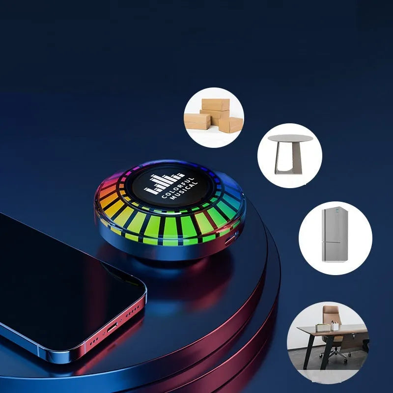 Small cube-shaped Bluetooth atmosphere lamp with colourful polar light display on a wooden surface