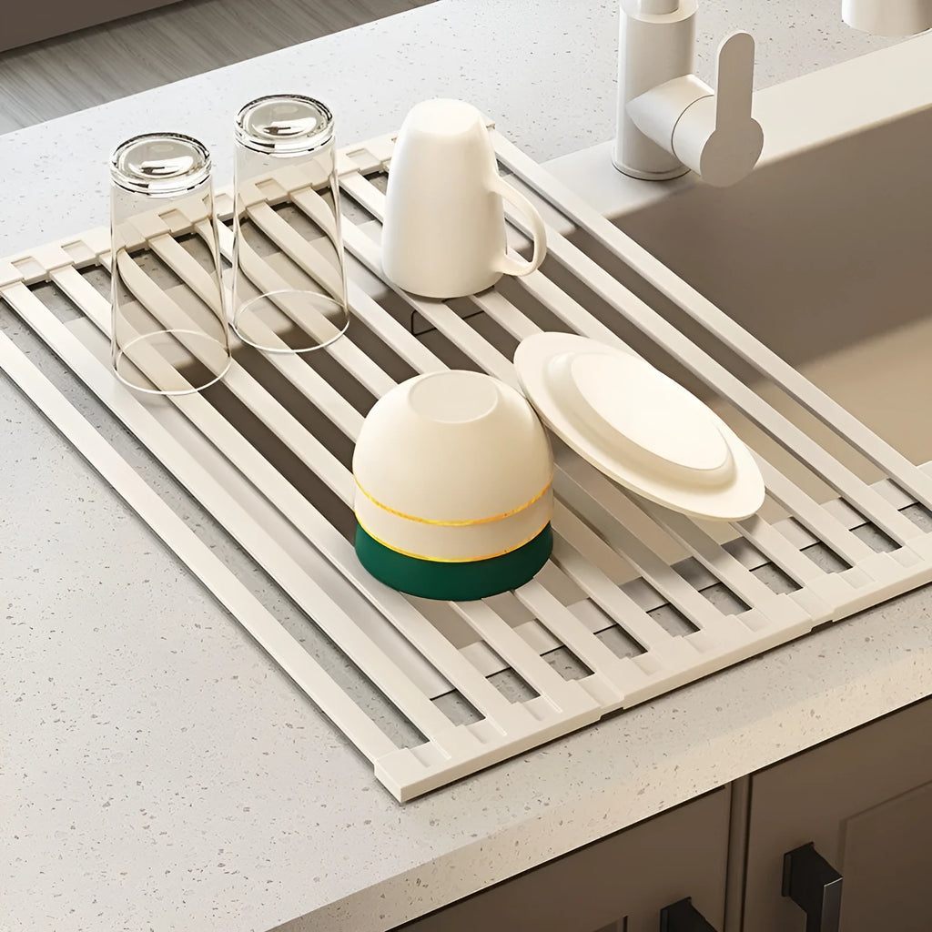 Foldable milky white stainless steel kitchen draining rack showing tri-fold design