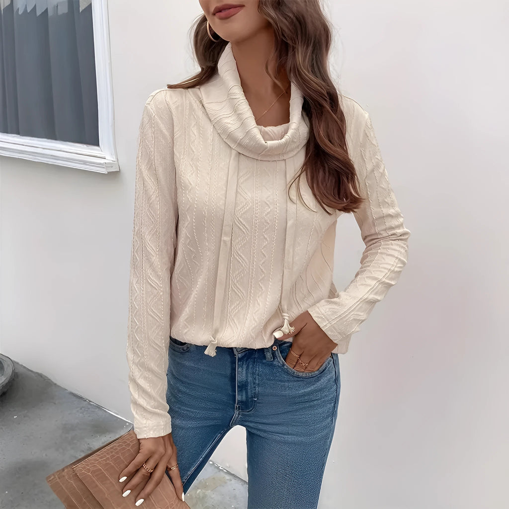 Apricot coloured women's hooded pullover sweater with long sleeves and a front drawstring.