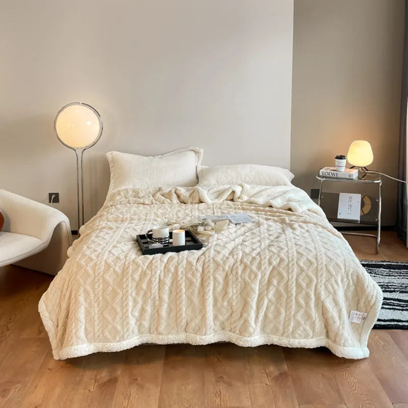 Polyester thermal flannel blanket in beige colour, shown folded to display its thick texture and modern style