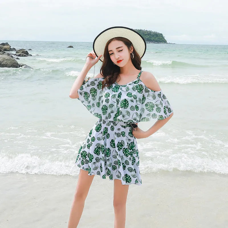 Women's printed one-piece swimsuit in polyester with green leaf or black letter style options
