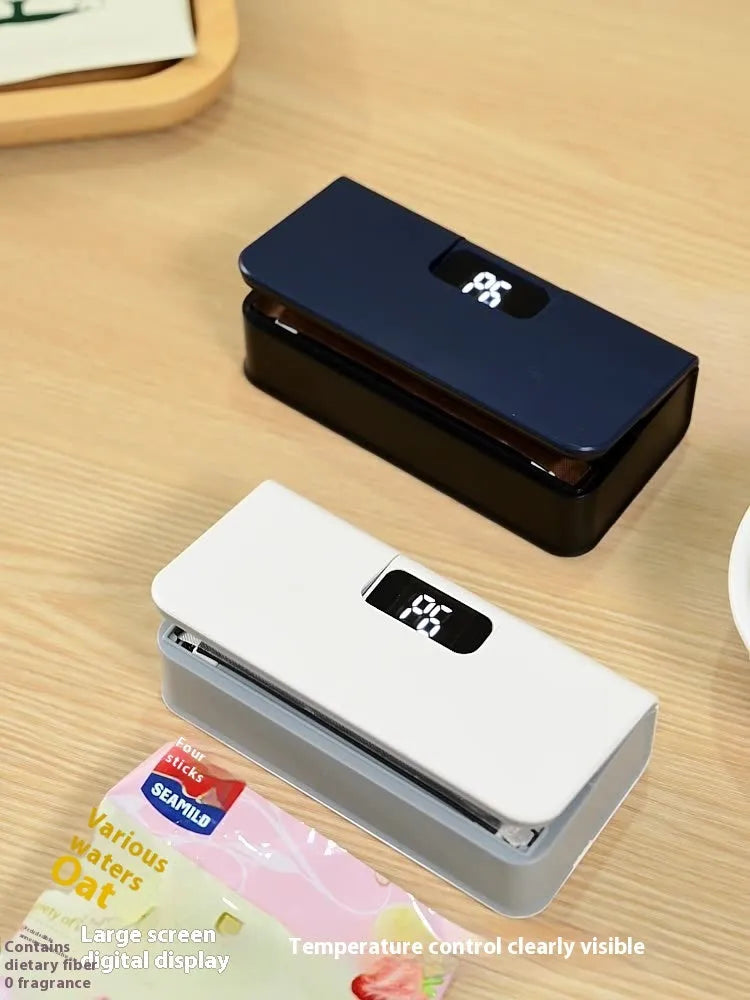 Blue and white portable mini heat sealing machine for plastic snack bags.