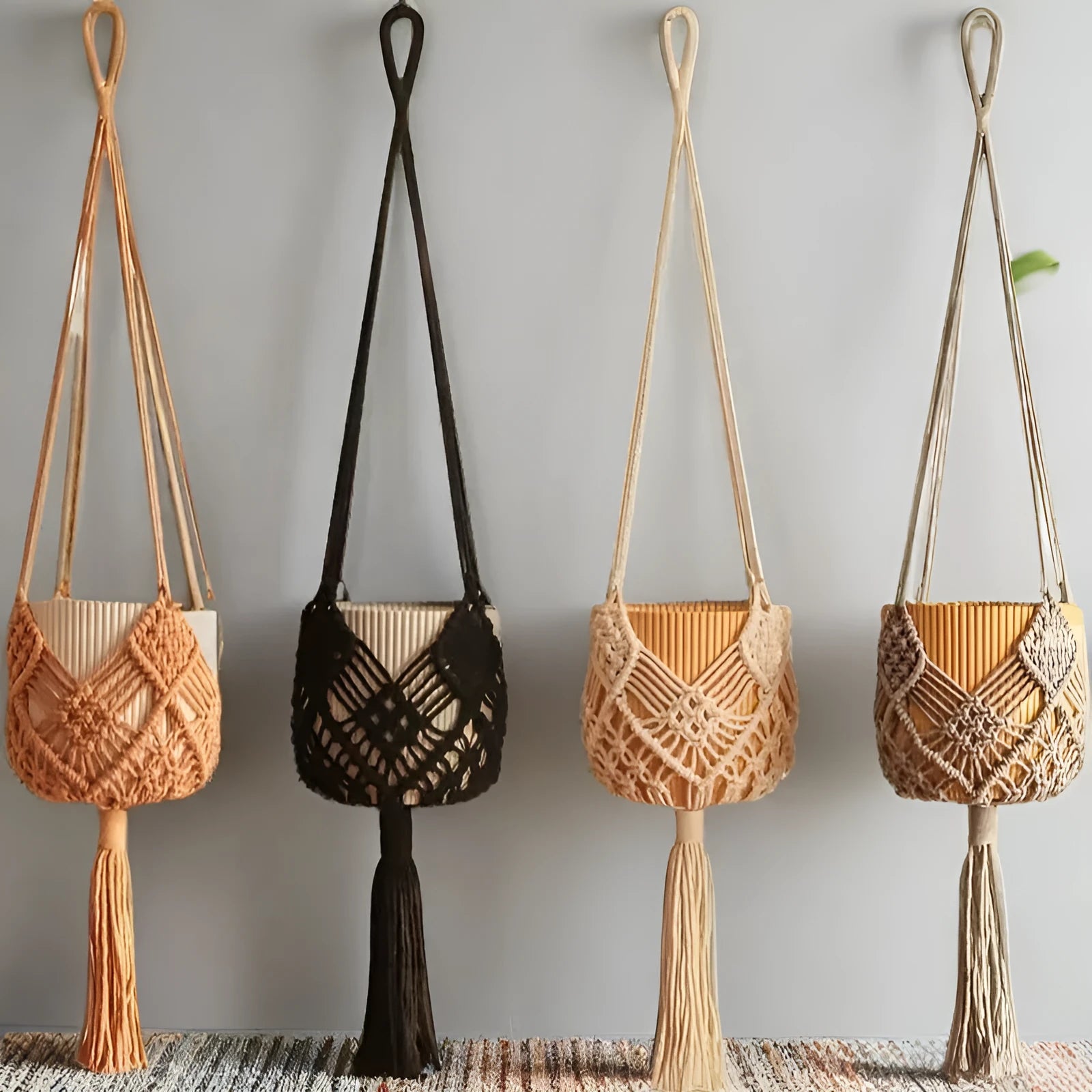 Hand-woven minimalist flower pot in polyester cotton fabric shown in brown colour