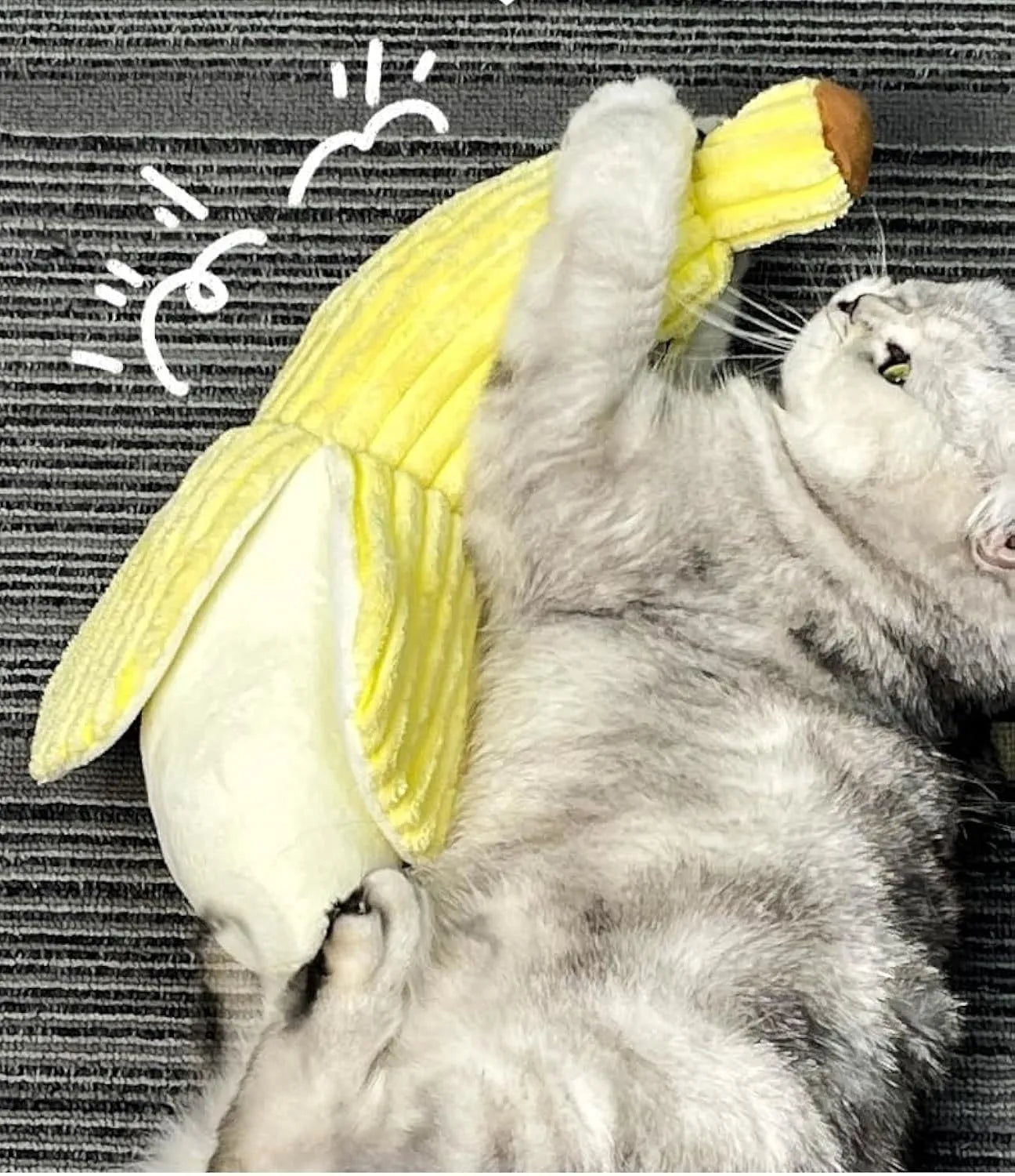 Yellow banana-shaped cat toy with crinkle paper sound feature measuring 13 inches long