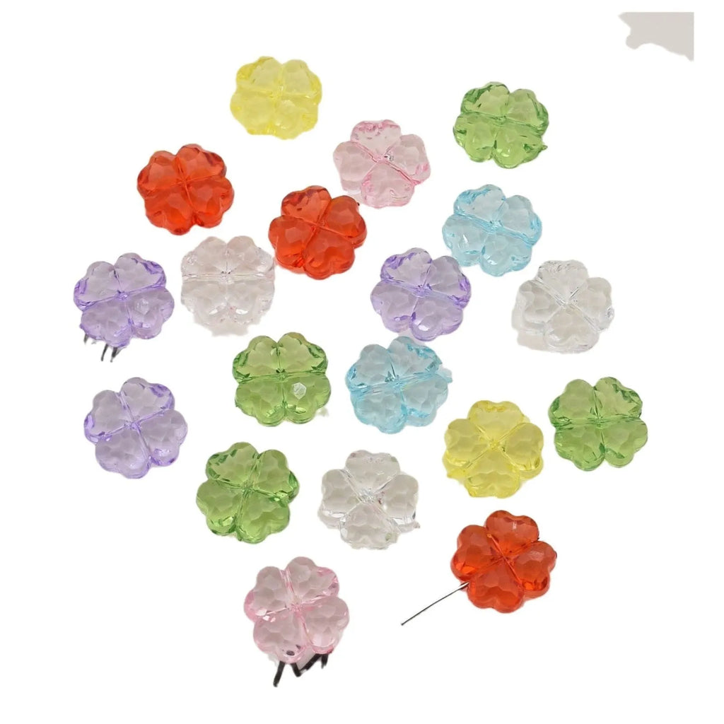 High transparency acrylic fat clover camellia beads scattered on white surface