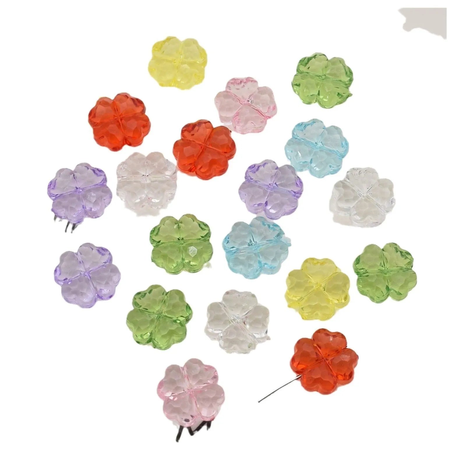 High transparency acrylic fat clover camellia beads scattered on white surface