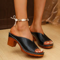Women's beige PU leather slippers with a thick block heel and round toe.