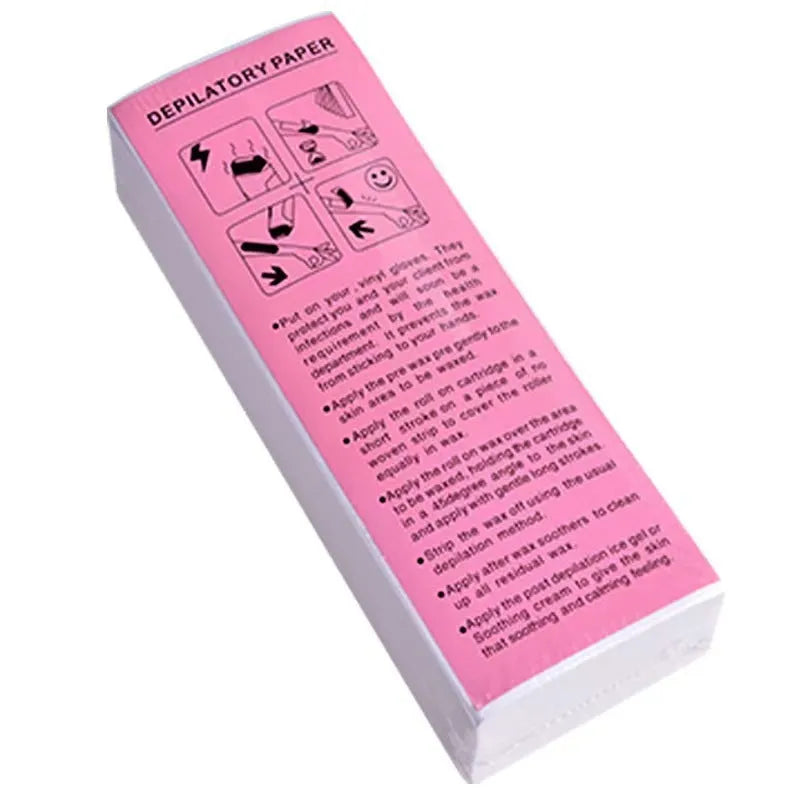 Pack of soft non-woven fabric hair removal wax paper strips on a pink background