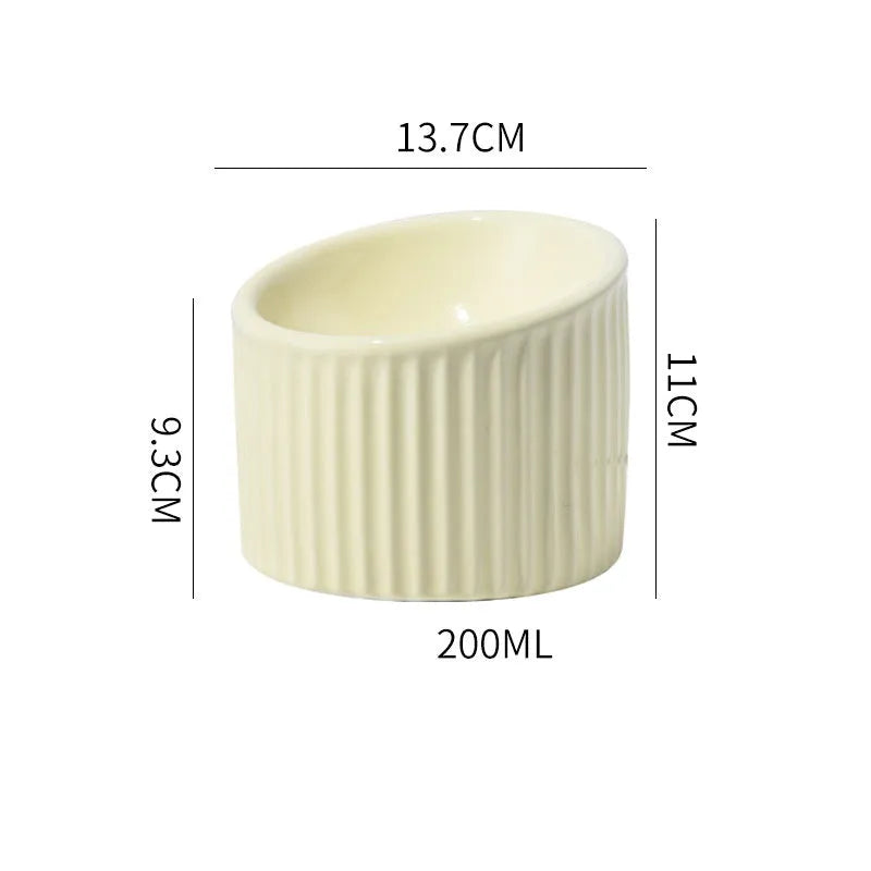 Ceramic elevated cat bowl in green colour with tilted design for anti-vomit feeding