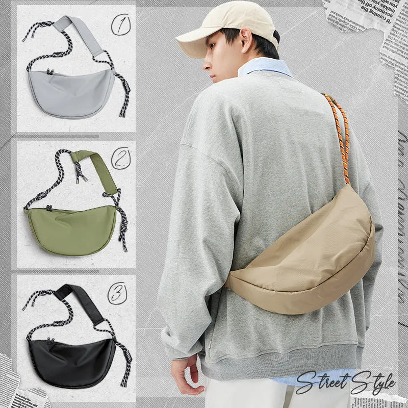 Men's lightweight nylon messenger bag in a choice of colours showing large capacity design.